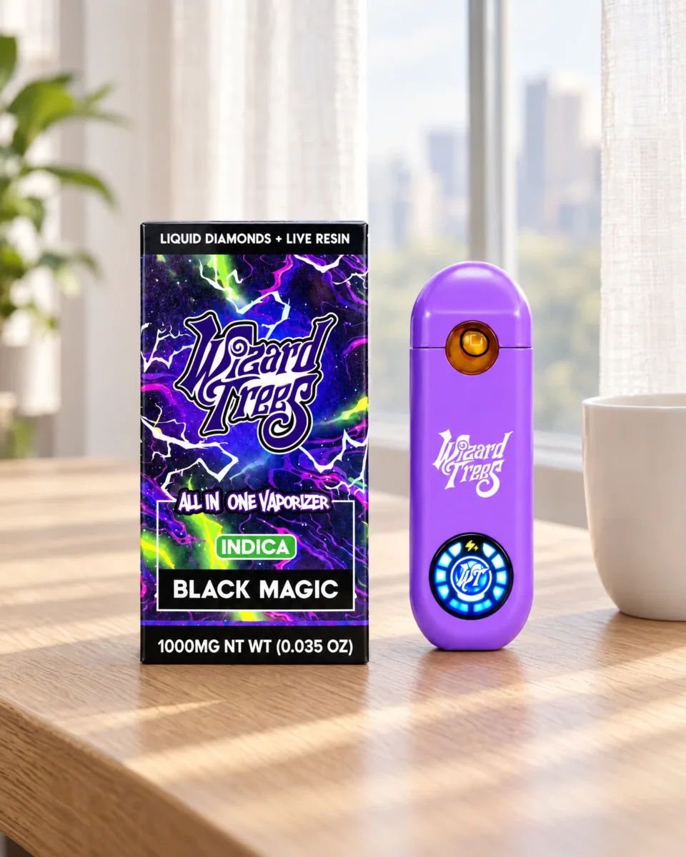 Black Magic di Wizard Trees, confezione e dispositivo su una scrivania in rovere